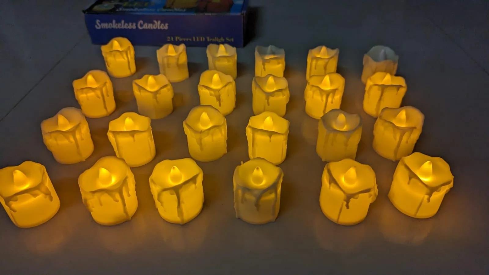 Dwarakesh Enterprises® Pack of 24 Battery Powered flameless mild Yellow Wax Dripping Ambient Romantic Flickering e-Led Yellow led Candles for Party, Functions(Cream Color, 5 * 4 cm)