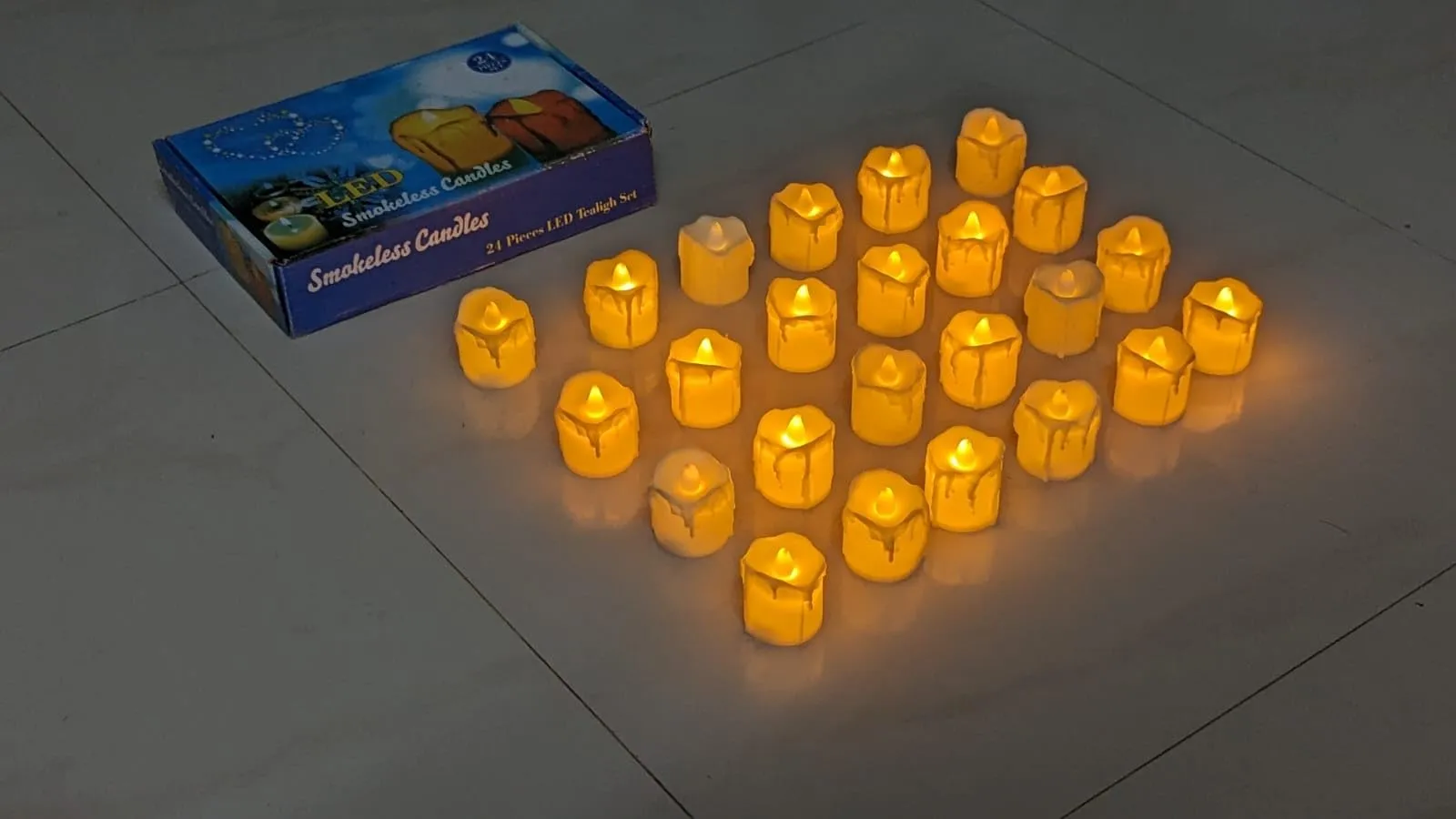 Dwarakesh Enterprises® Pack of 24 Battery Powered flameless mild Yellow Wax Dripping Ambient Romantic Flickering e-Led Yellow led Candles for Party, Functions(Cream Color, 5 * 4 cm)