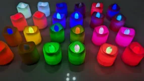 Dwarakesh Enterprises® pack of 24pcs Battery Powered designer Ambient Romantic Electric flameless multicolor Tealight Candles with flickering multi led flameless e-Led Candles for party, dinner, function, festivals(Multicolor, 4.7 * 3.7cm)